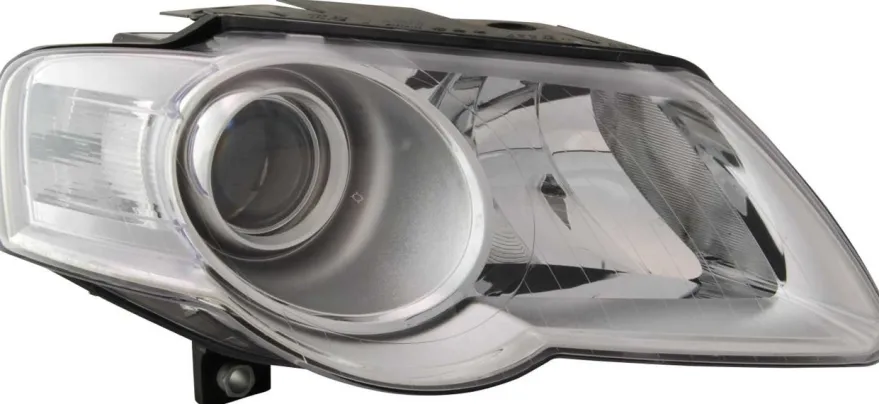 Strålkastare Höger VW Passat 3C